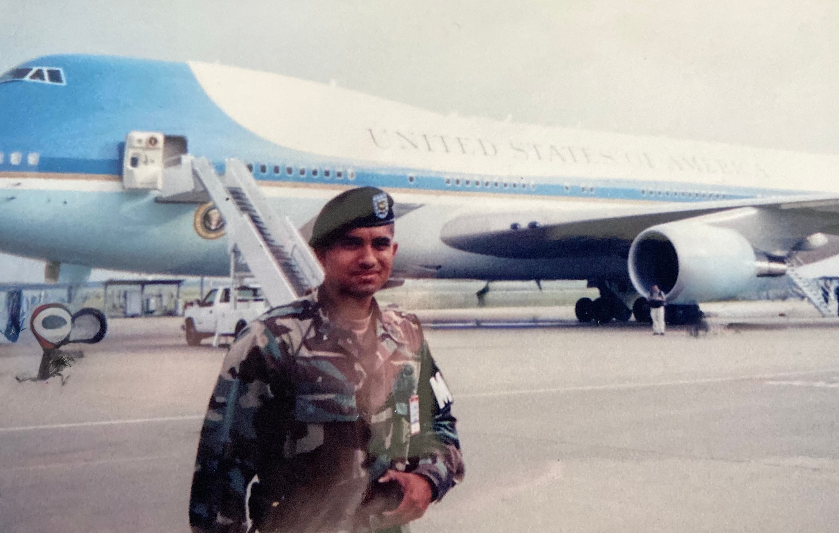Bart Vasquez with U.S. Air Force Reserves, standing before aircraft